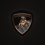 a Lamborghini logo on a black background