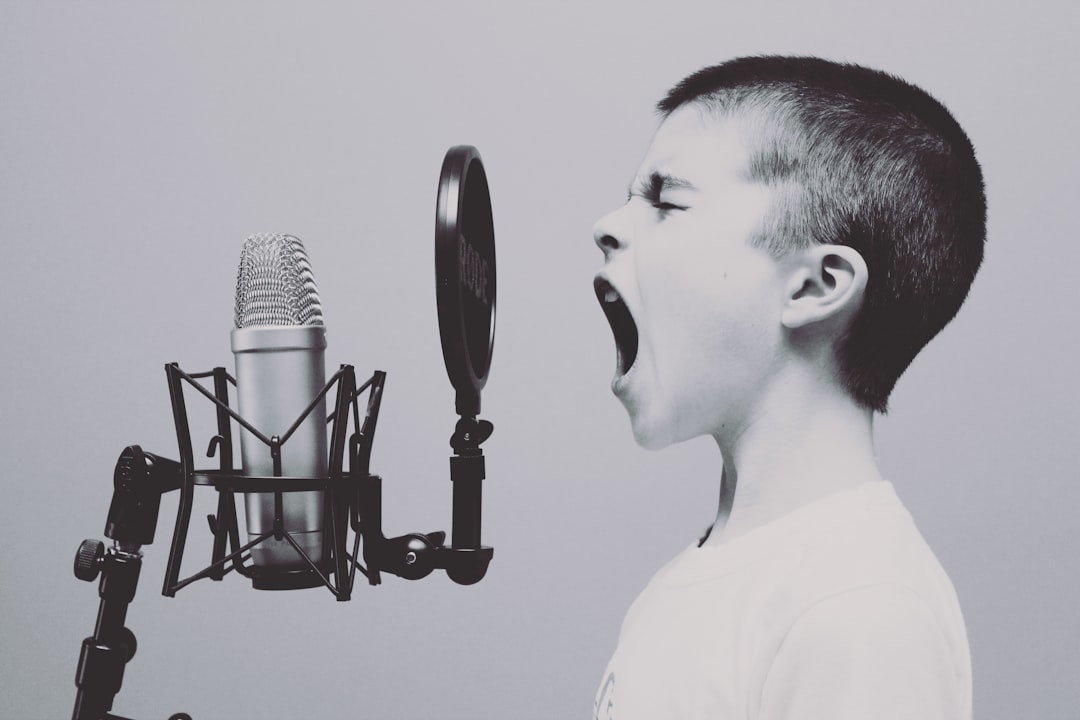 Conclusion by Audio Brands boy singing on microphone with pop filter